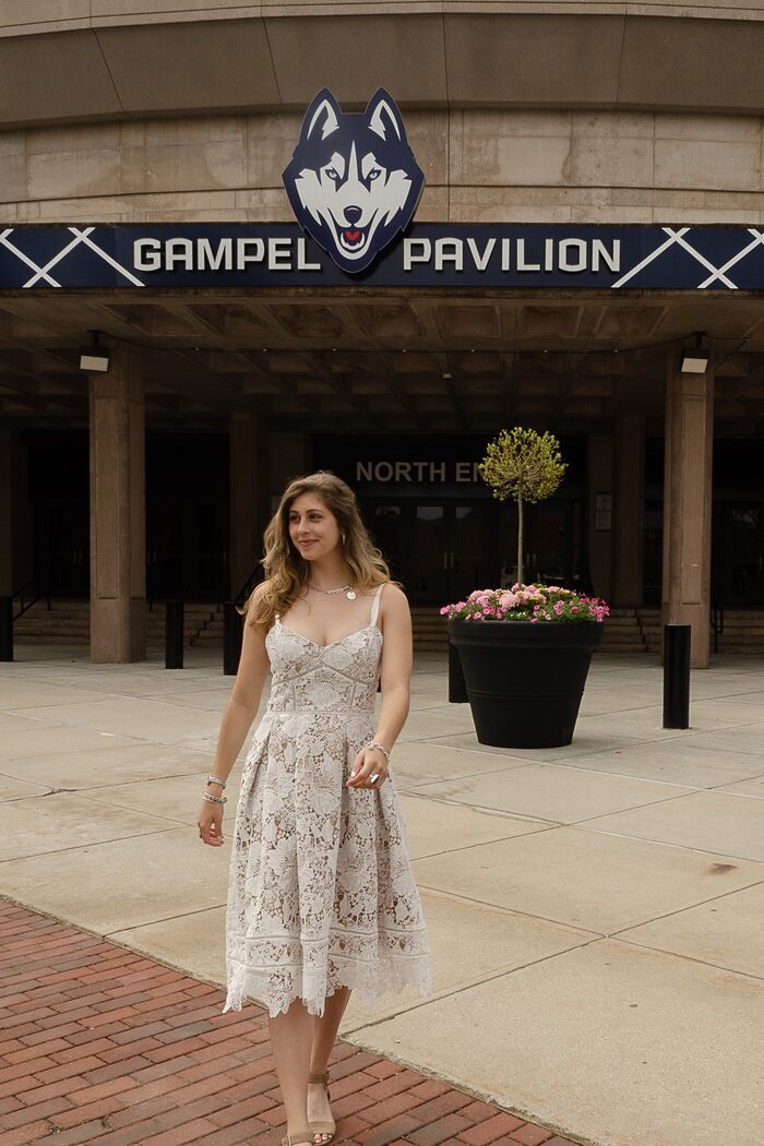 Alexa Bush at her University of Connecticut graduation outside Gampel Pavilion